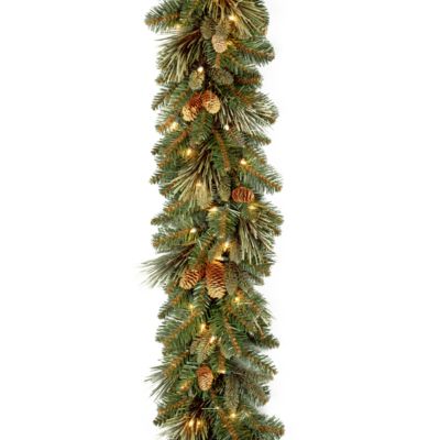 National Tree Company - 9' x 10" Carolina Pine Garland with 27 Flocked Cones and 100 Clear Lights
