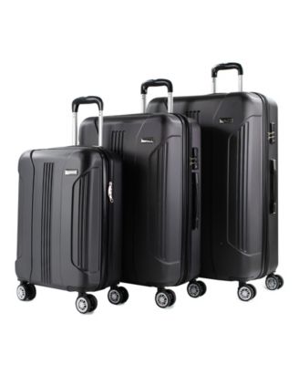 green hardside luggage