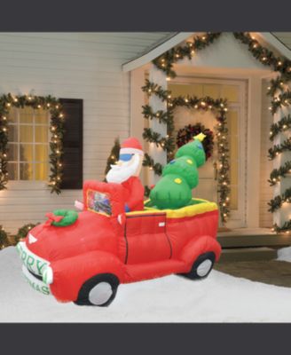 Jeco - 7' Inflatable Santa In Red Trunk With Christmas Santa on Car