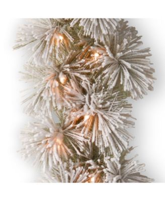 National Tree Company 9' x 12" Snowy Bristle Pine Garland with 70 Clear Lights