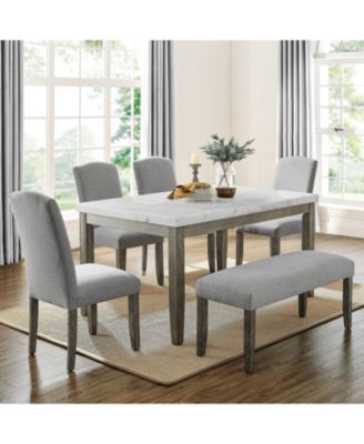 grey and white round table and chairs