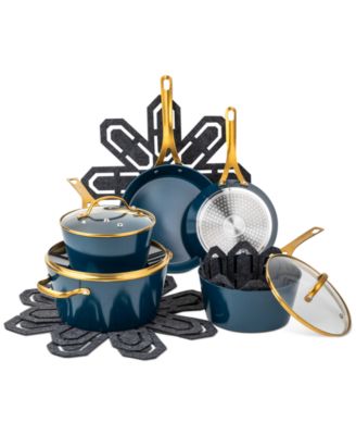 Photo 1 of Brooklyn Steel Co. 12-Pc. Orbit Cookware Set

Set includes
8" frypan
10" frypan
2.5-qt. pan with lid
4 qt. sauté pan with lid
5 qt. Dutch oven with lid
Four felt cookware protectors
Pressed aluminum with a stainless steel base
Multi-layer nonstick coating