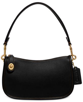 coach purse over shoulder