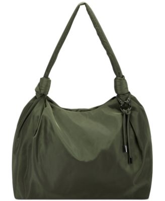 Photo 1 of INC International Concepts Nosida Soft Nylon Tote, Created for Macy's Army Green
17"W x 16"H x 5"D 13"L handle
Top-zip closure
Silver-tone exterior hardware & tassel detail
2 interior slip pockets & 1 zip pocket
Fits iPad or smaller
Created for Macy's
Bod