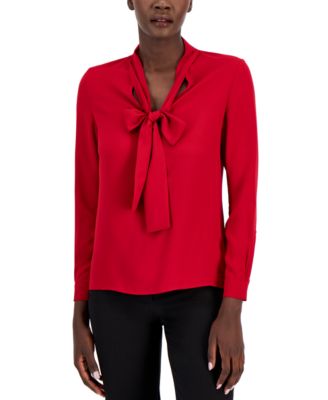 red blouse with neck tie