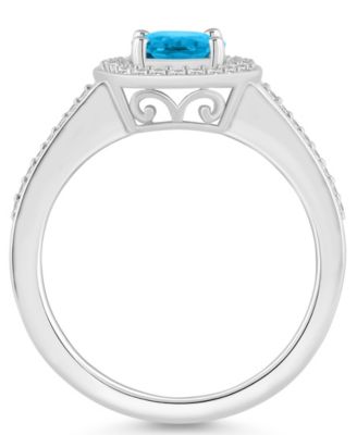 Blue Topaz (1-3/5 ct. t.w.) and Diamond (1/5 ct. t.w.) Halo Ring in Sterling Silver