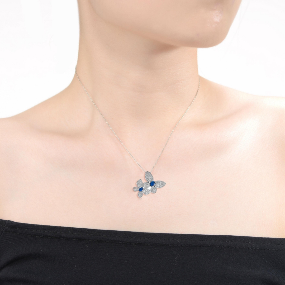Genevive Sterling Silver White Gold PlatedCubic Zirconia Double Fluttering Butterfly Pendant Necklace - Blue