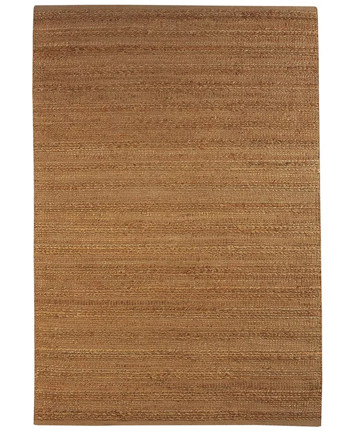 Natural braided jute area rug in tan and beige tones for a cowgirl coastal living room