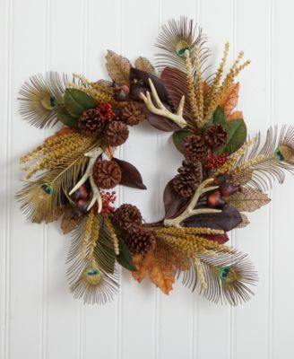 27" Magnolia Leaf, Berry, Antler & Peacock Feather Artificial Wreath