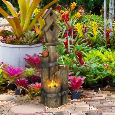 Outdoor Fountain with Backyard Birdhouse Tree Trunk Design