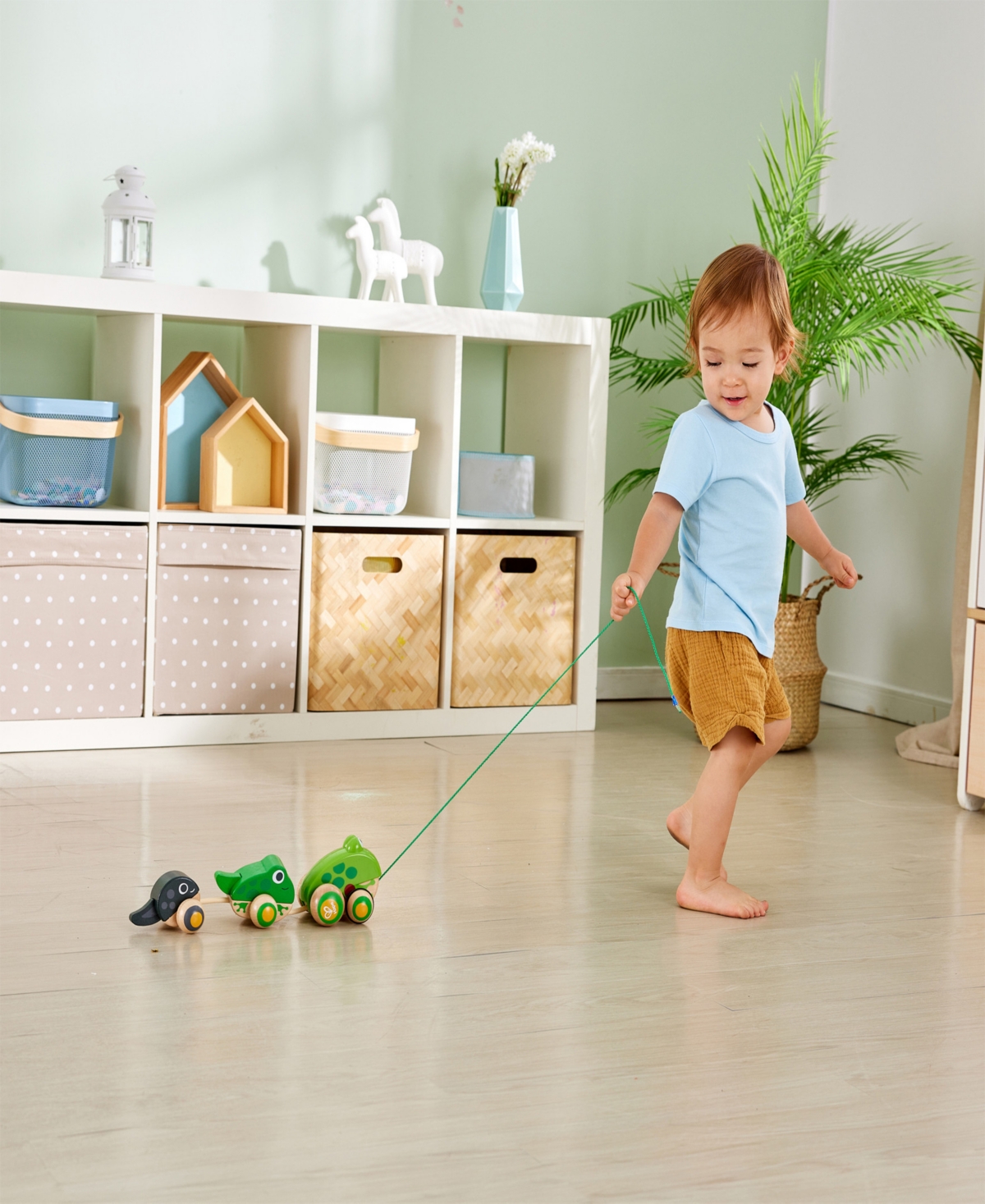 Shop Hape Pull-along Frog Family Toddler Toy In Multi