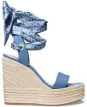 Blue lace up store wedges