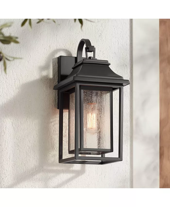 A black wall sconce light