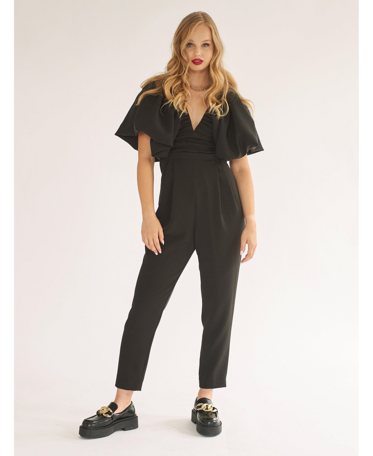 Women's Puffed sleeve jumpsuit with V-neck and pleated front and open back - Black