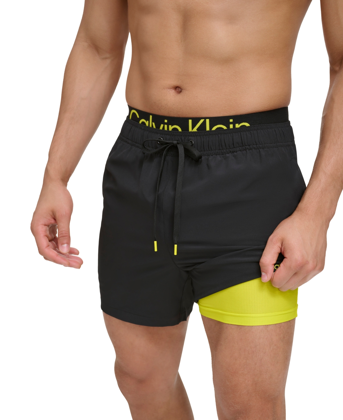 Shop Calvin Klein Men's Logo Elastic Waist Modern Euro 5" Volley Swim Trunks In Black