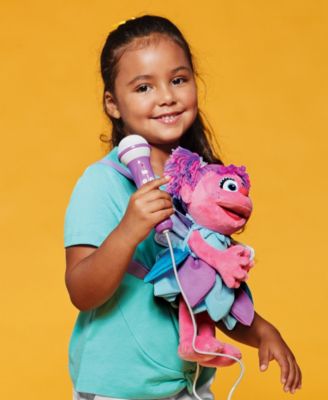 Plush Toy Karaoke Backpack with Microphone, Speaker, Songs Sound Effects, Sesame Street Abby Caddaby