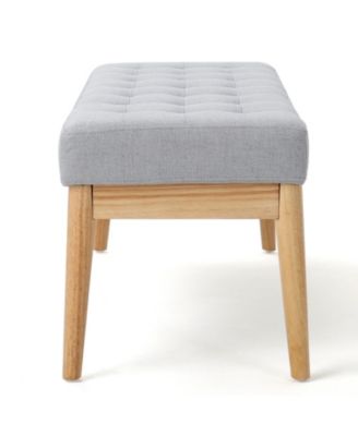 tufted upholstered design with mid-century modern charm is offered as a stylish bench