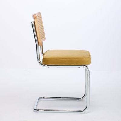 Elegant Velvet Armchair with Rattan and Steel