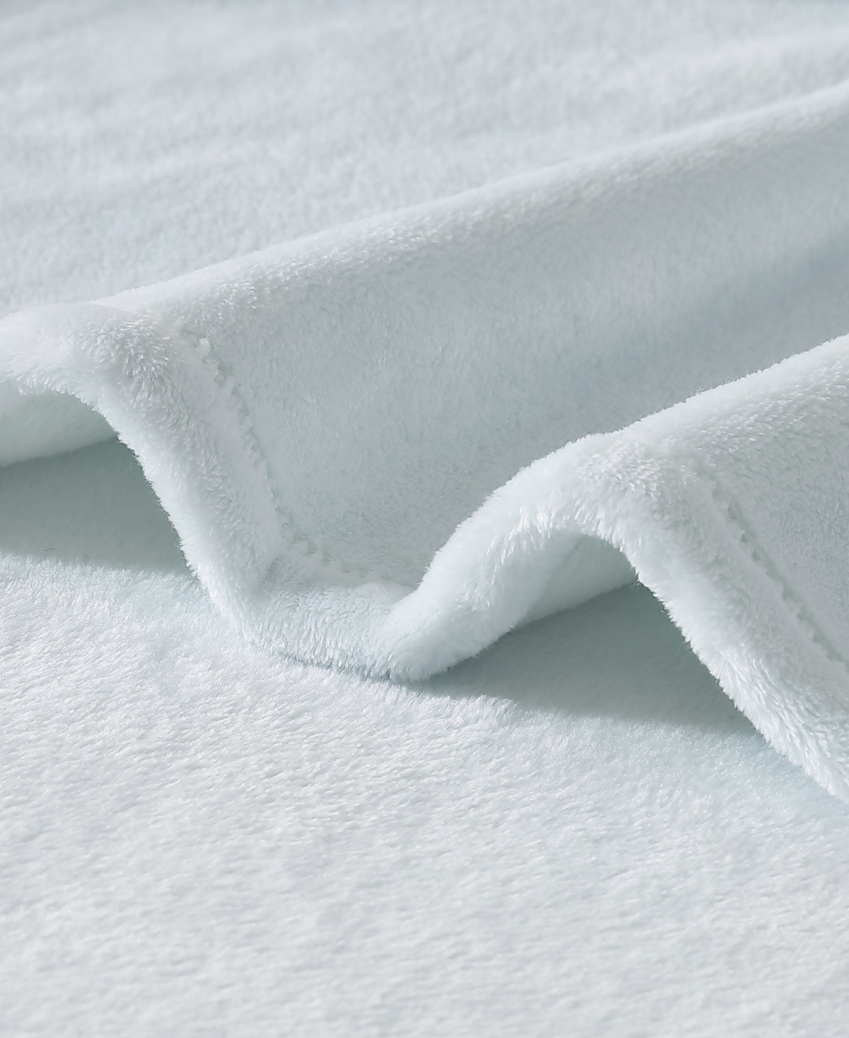 Tommy Bahama Home Solid Ultra Soft Plush Blankets In Blue Sea