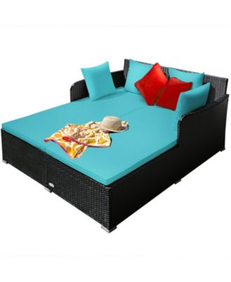 Spacious Outdoor Rattan Daybed with Upholstered Cushions and Pillows