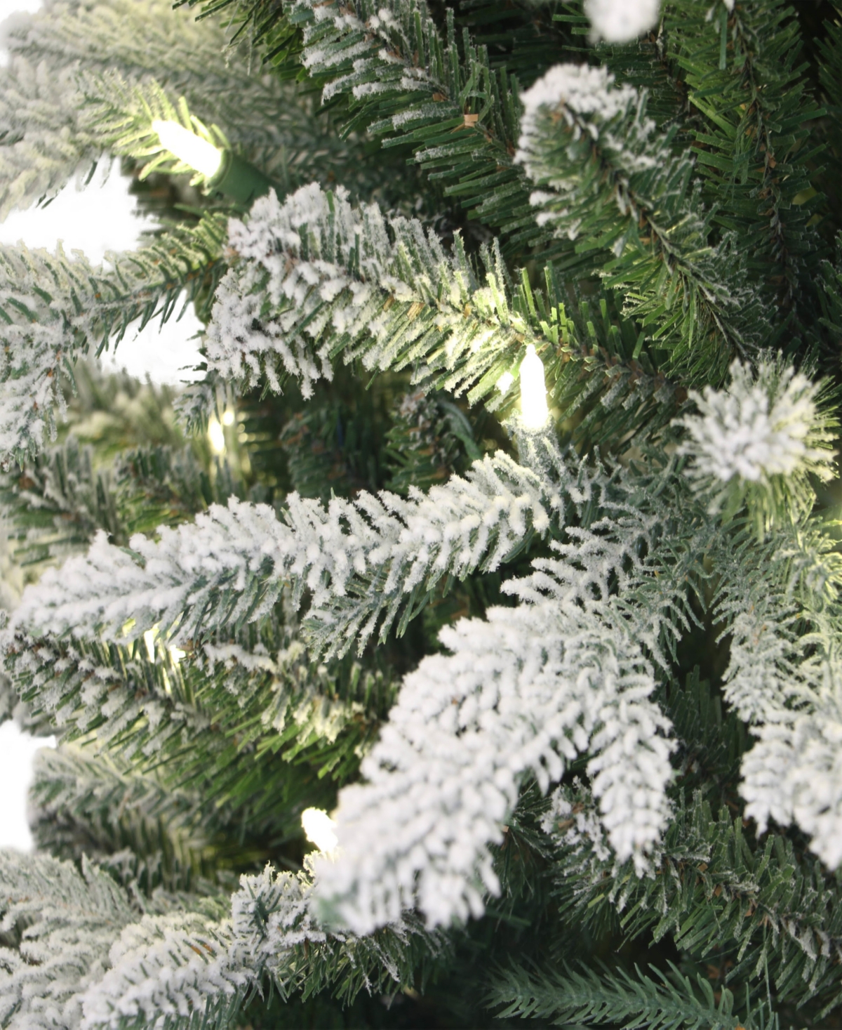 Puleo International 4.5 ft. Pre-Lit Potted Flocked Scandinavian Fir Artificial Christmas Tree with 70 Ul-Listed Clear Lights