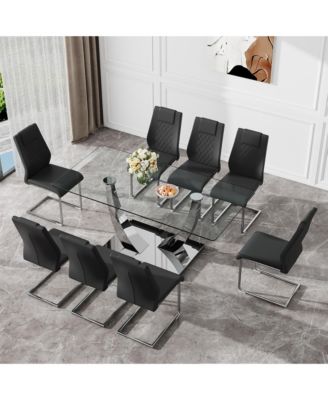 Table and chair set.Contemporary, minimalist rectangular dining table featuring a clear tempered glass top and sleek silver legs. Paired with chairs made of PU material cushion and silver metal legs.