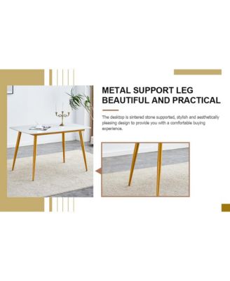 Table and chair set.A morden table with White imitation marble patterned stone burning tabletop with golden metal legs.Paired with 4 chairs with PU leather backrest and black metal legs.