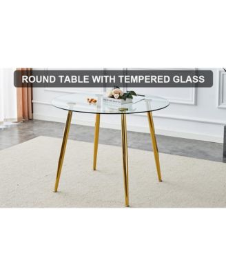 A glass tabletop with a diameter of 40 inches and a modern minimalist circular dining table with gold plated metal legs. 40 ' 40' 30 ' DT-1164