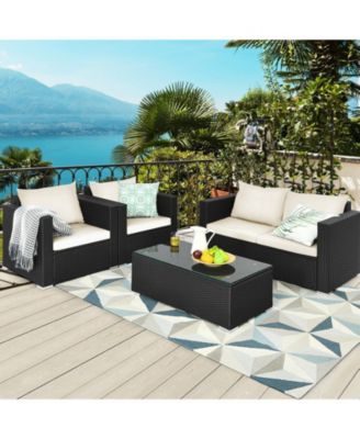 4 Pieces Patio Rattan Conversation Set with Padded Cushion and Tempered Glass Table