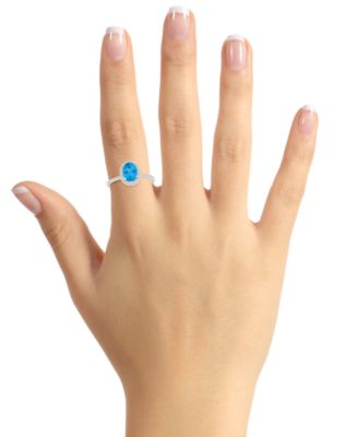 Blue Topaz (1-3/5 ct. t.w.) & Lab Created White Sapphire (1/5 ct. t.w.) Oval Halo Ring in 10k White Gold (Also in Additional Gemstones)