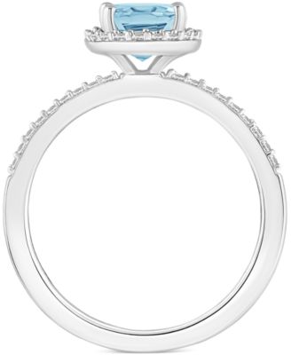 Lab-Created Ruby (1-1/4 ct. t.w.) & Lab-Created White Sapphire (1/5 ct. t.w.) Halo Ring in 10k White Gold (Also in Additional Gemstones)