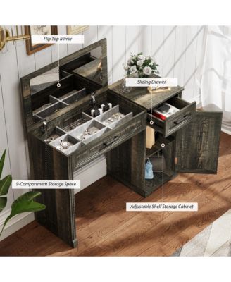 Vanity desk with mirror and storage drawers.