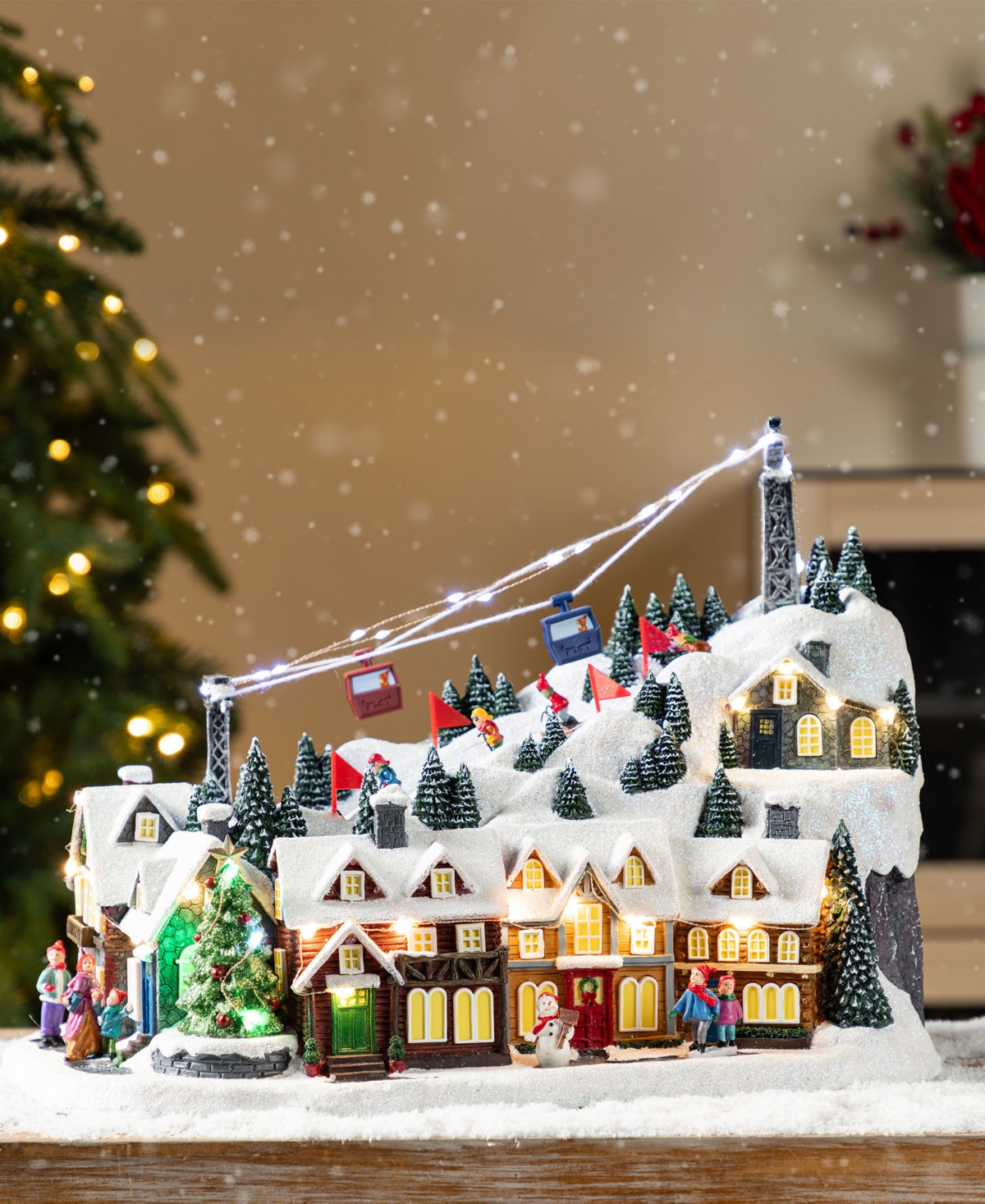 Glitzhome 16" Christmas Oversized Resin Lighted Musical Skiing Village In Multi