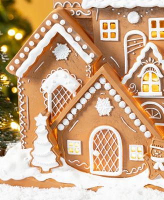17.75" Lighted Resin Christmas Gingerbread House Figurine