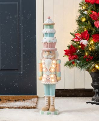 28" Lighted Macaron Resin Christmas Cupcake Nutcracker Porch D&eacute;cor