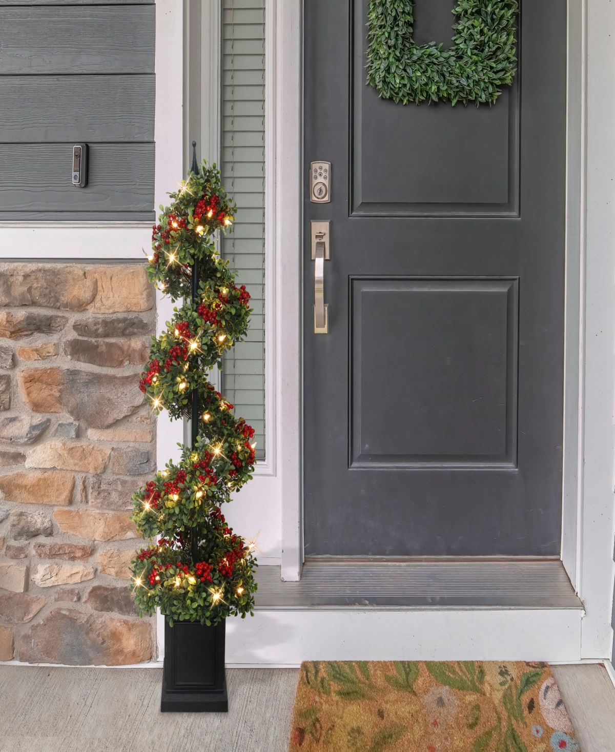 Puleo 4' Pre-lit Artificial Potted Swirl Tree Adorned With Red Berries In Multi
