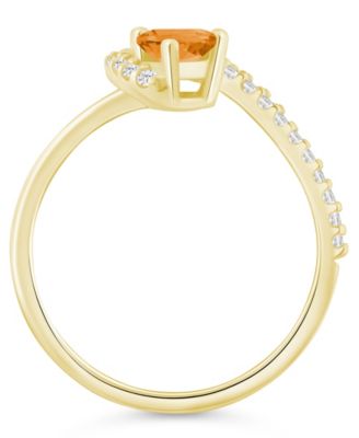 London Blue Topaz (1-1/20 ct. t.w.) and Diamond Ring (1/5 ct. t.w.) in 10k Yellow Gold