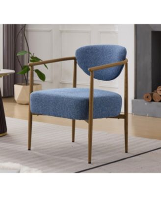 Blue fabric dining/living/bedroom chair with metal frame, wood grain visual.