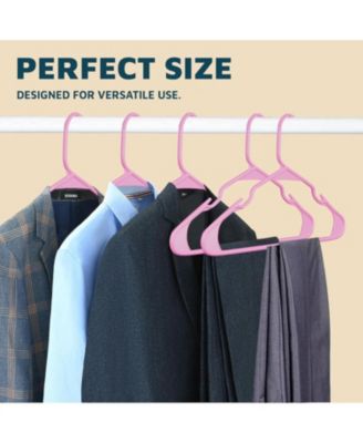 Heavy-duty pink plastic hangers with non-slip grooves, space-saving design, hold up to 5 lbs—ideal for clothes, dresses & coats