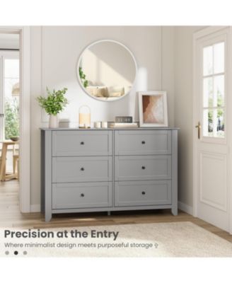 wooden construction features six deep drawers, metal knobs, and a wide 54-inch design, created as a modern dresser