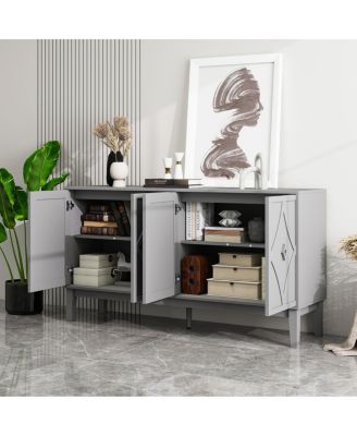 Vintage 4-door cabinet with hand-carved geometric doors and adjustable shelves