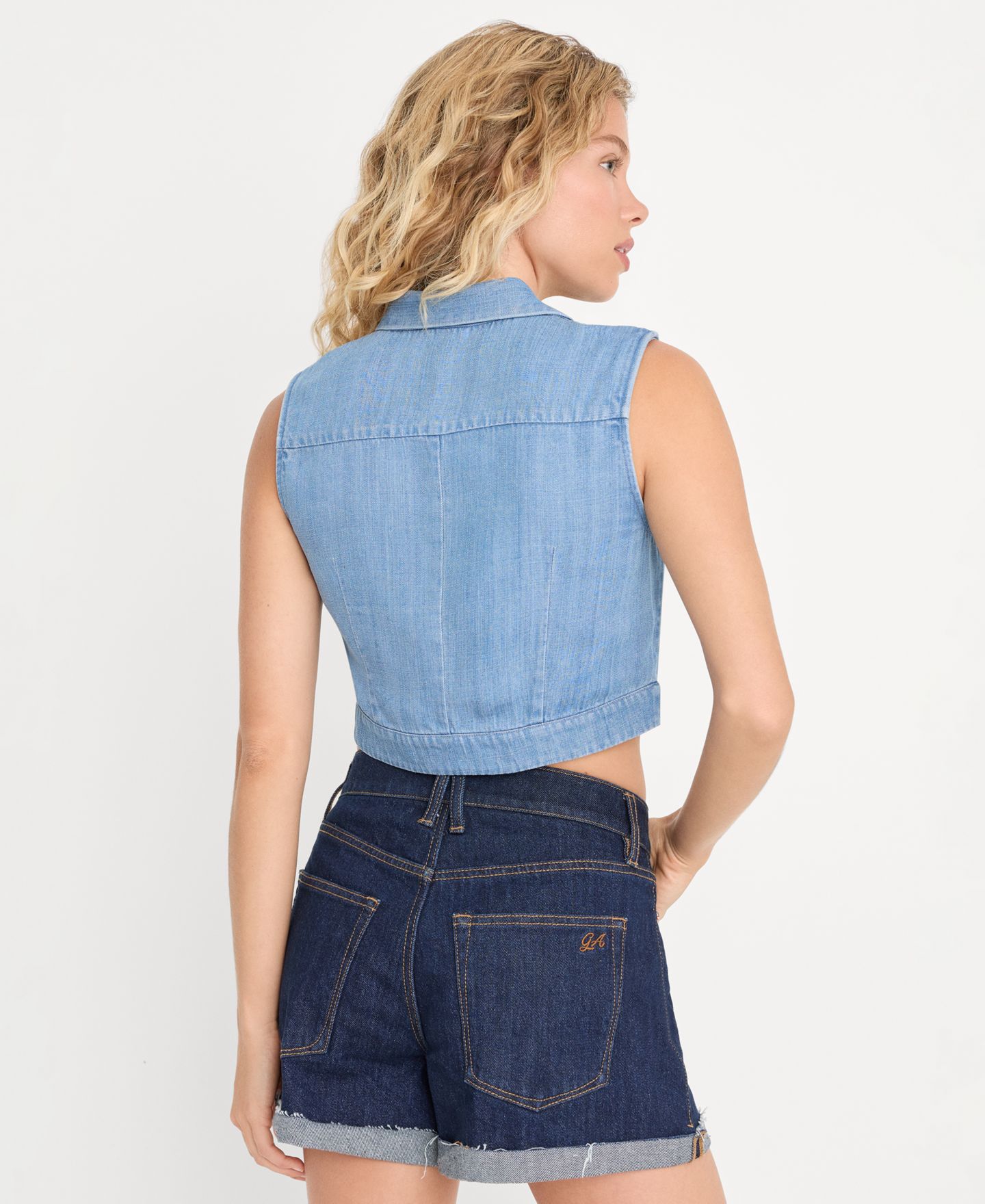 Женский топ Good American Denim Sleeveless Button-Up, цвет: Индиго — фото 4
