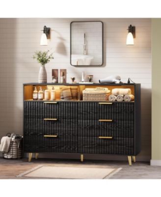6 Drawer Dresser with LED Lights and Charging Station, Fluted Wood Design, Handles, and Open Shelf Storage for Any Room.