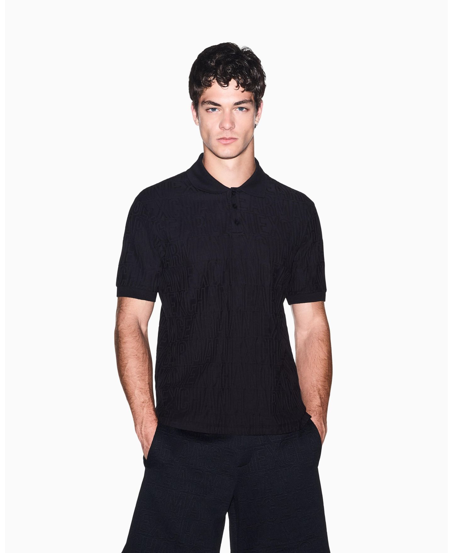 Мужское поло A|X Armani Exchange Mercerized Jacquard Cotton All Over Logo Polo Shirt, цвет: Чёрный — фото 1