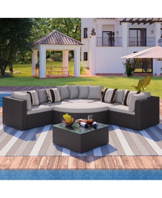 7-Piece Outdoor Wicker Patio Sectional Sofa Set with Cushions and Colorful Pillows