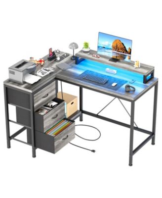 L Shaped Computer Desk with Power Outlets and LED Lights - 3 Drawers, Storage Shelves, Monitor Stand - Reversible Corner Gaming Workstation
