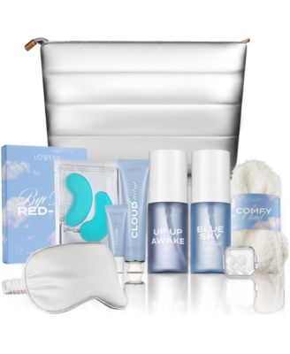 Sky Skin Flight Glow Travel Kit 13-piece hydrating skincare set with face mist, serum, eye patches, sleep mask & more. Perfect travel gift