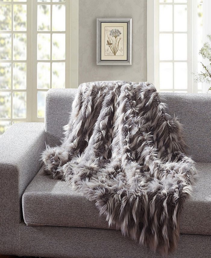 De moocci faux shop fur throw