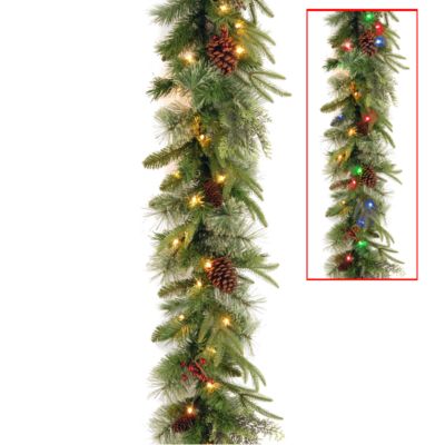 National Tree Company - National Tree 9' x 10" Feel Real(R) Colonial Garland with 15 Pine Cones, 15 Red Berries and 50 Dual Color(R) Battery Operated LED Lights w/Timer-9 Functions