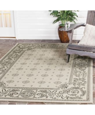 Courtyard Sand and Black 6'7" x 9'6" Outdoor Area Rug